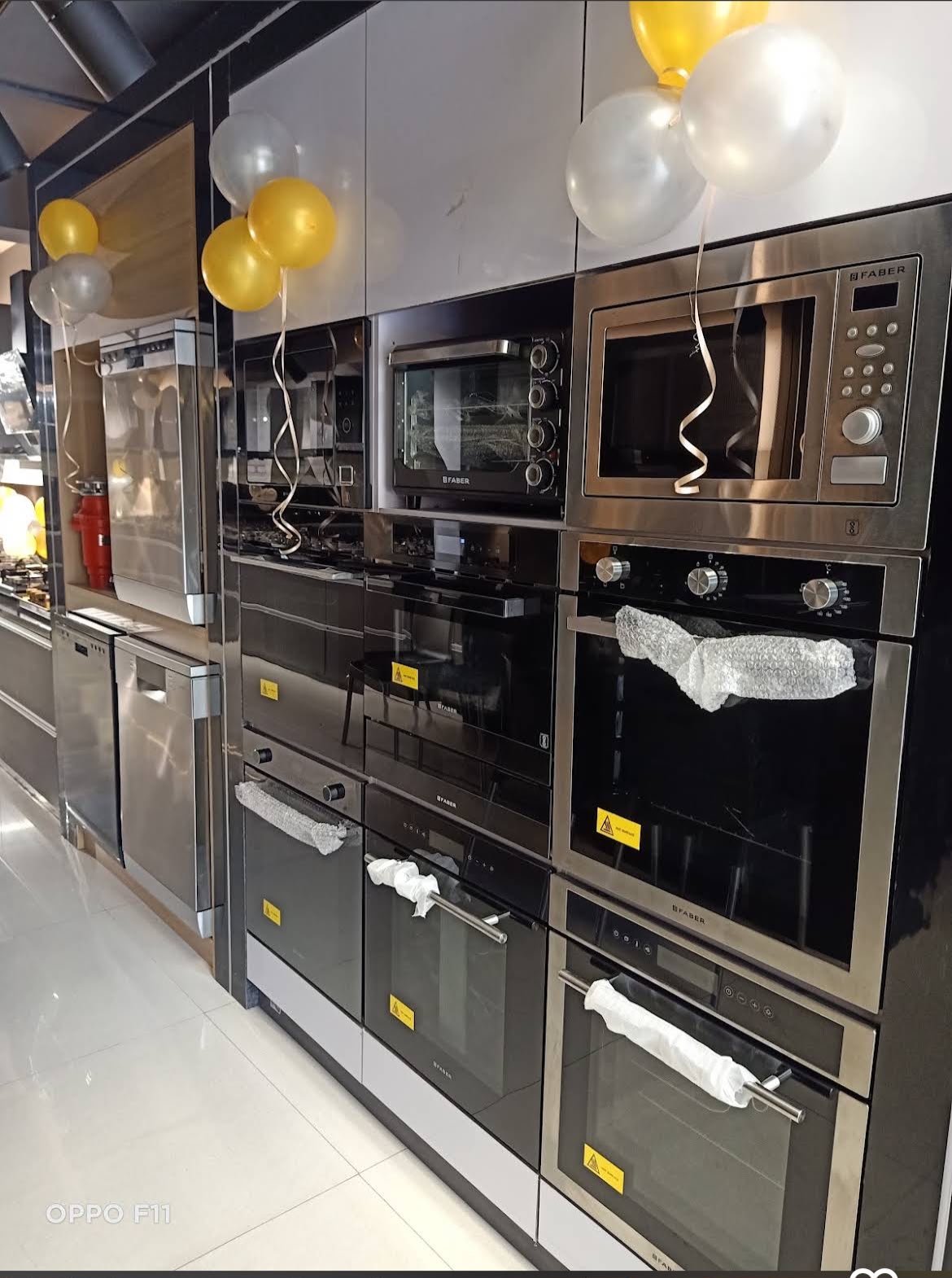 Built-in ovens and kitchen appliances on display